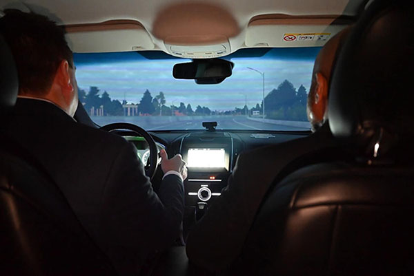 Congressman Richard Hudson behind the wheel in the driving simulator